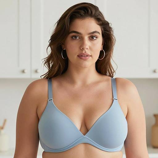 Woman in Light Blue Bra with Hoop Earrings