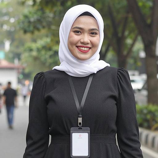 Smiling Asian Woman in White Hijab