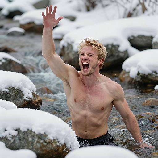 Muscular Shirtless Man in Snowy Stream