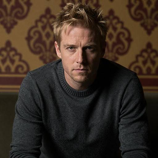 Moody Portrait of Blonde Man in Sweater