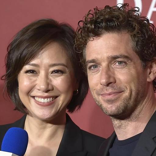 Smiling Man and Woman with Microphone