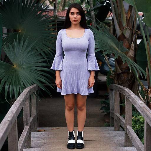 Woman in Lilac Skater Dress in Tropical Garden