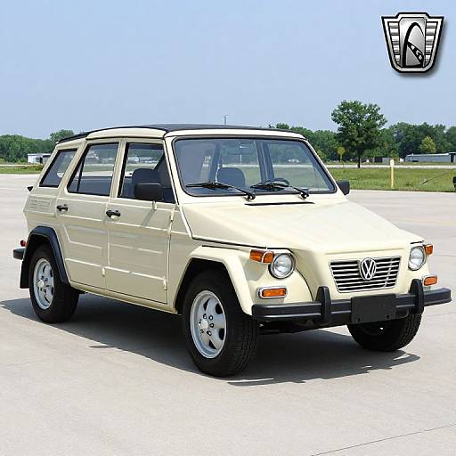 Photograph of a vintage cream-colored Volkswagen Vanagon parked on a sunny, empty concrete lot with a blue sky and green trees in the background. VW