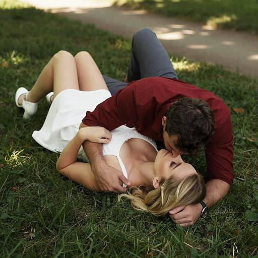 Intimate Kiss in Sunlit Grass
