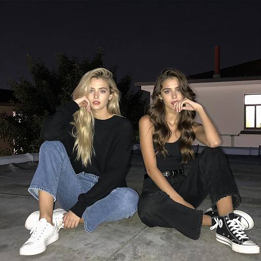 Nighttime Rooftop Scene with Two Women