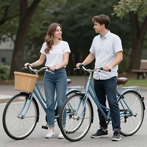 Couple Standing Next to Bicycle