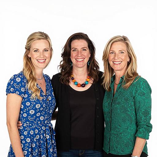 Three Smiling Women in Colorful Clothing