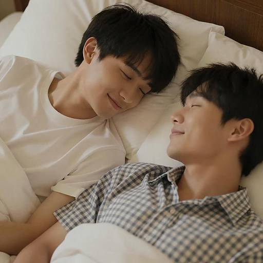 Intimate Moment Between Two Men in Bed