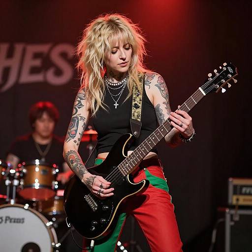 Tattooed Blonde Guitarist on Stage