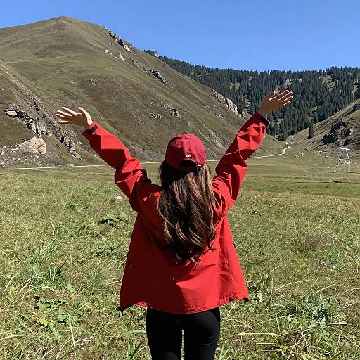 Woman in Red Cap in Scenic Meadow