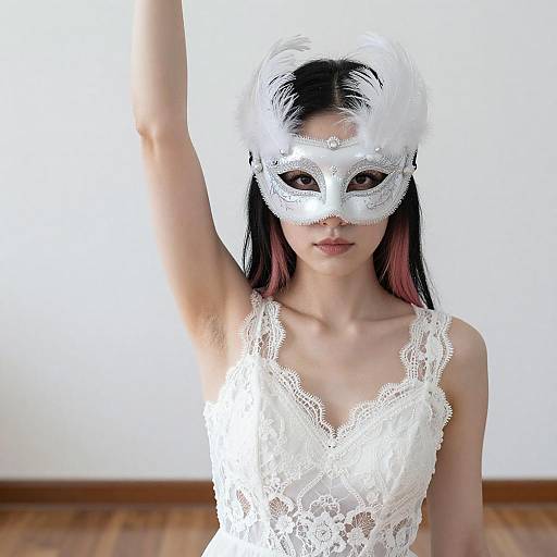 Elegant Woman in White Feathered Mask