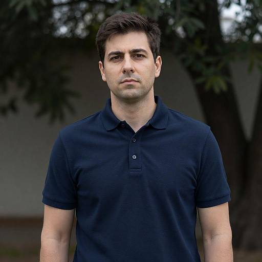 Serious Man in Navy Polo Outdoors