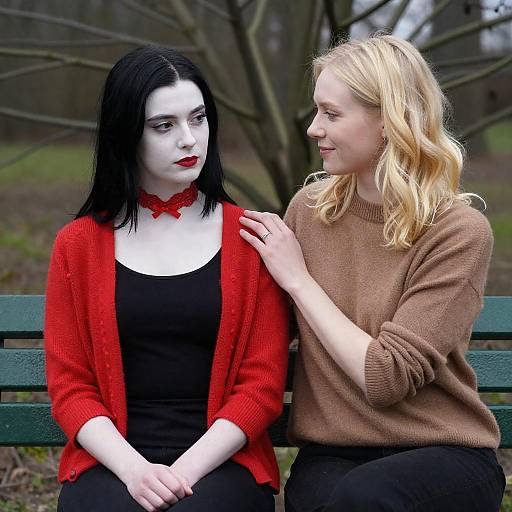 Two Friends Relaxing on a Green Bench