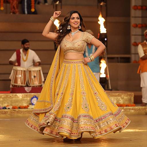 Photograph of a confident Indian woman in a sparkling yellow traditional lehenga, dancing on a stage with musicians in the background.