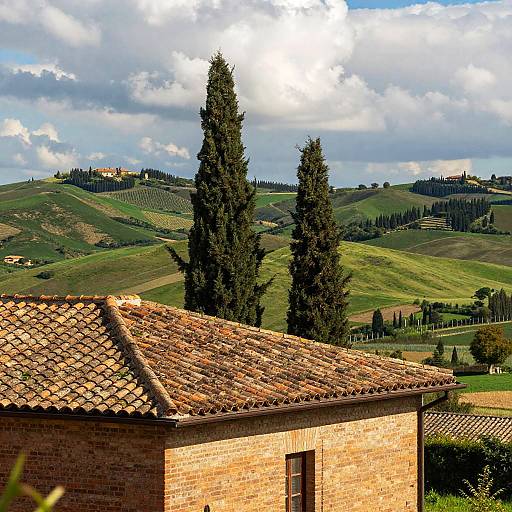 Rustic Brick Building with Cypress Trees in Tuscan Landscape