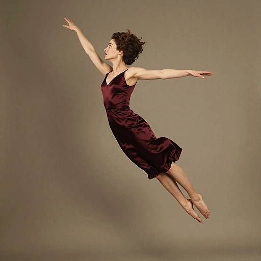 Woman in Burgundy Silk Dress Flying