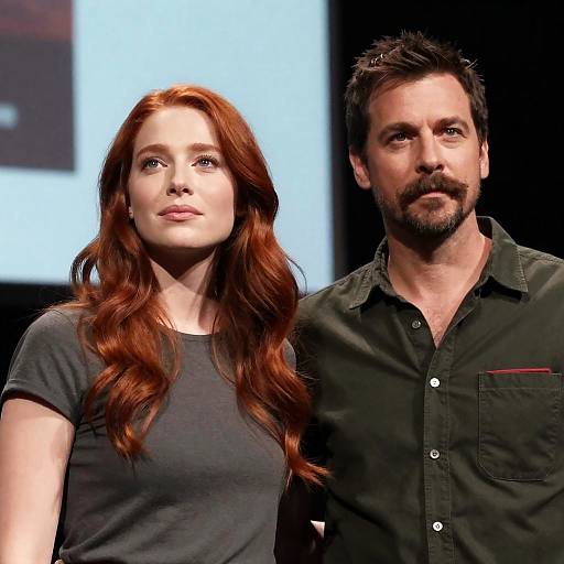 Red-haired Woman and Mustached Man Standing Together