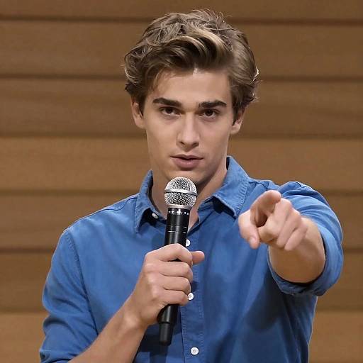 Serious Young Man with Microphone Portrait