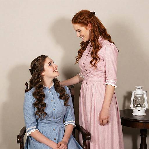 Victorian Elegance: Two Women in Dresses