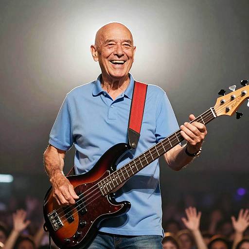 Elderly Man Playing Electric Bass Guitar