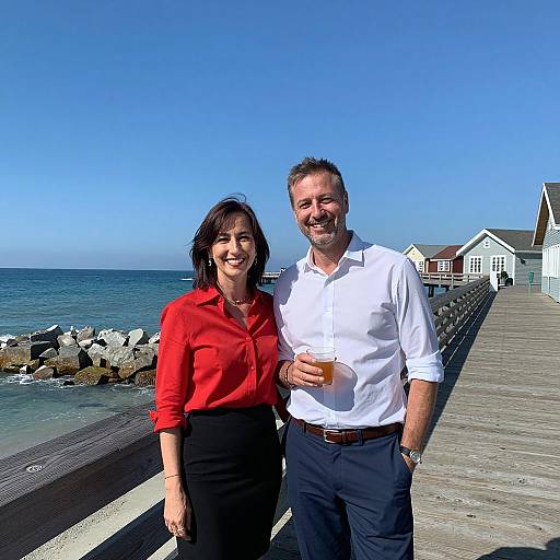 Smiling couple on seaside pier