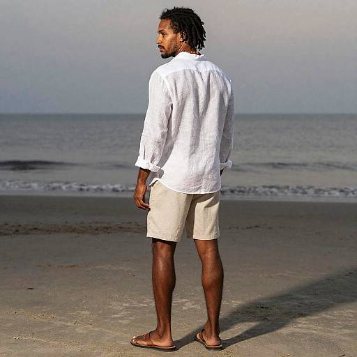 Confident Man at Dawn Beach