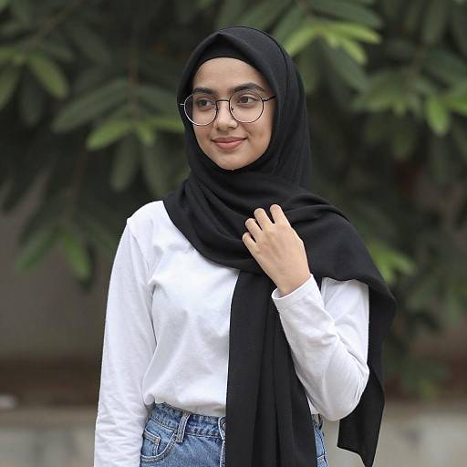 Young Woman in Black Hijab Outdoors