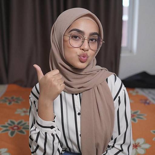 Portrait of Woman in Brown Hijab