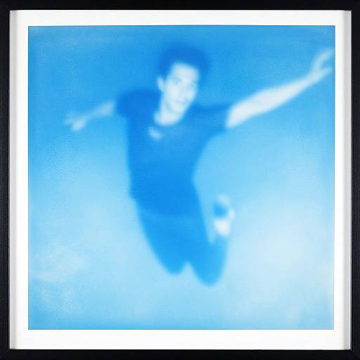 Abstract digital artwork with a bright blue and white gradient background, featuring a blurred, indistinct central figure resembling a dynamic pose. Black border.