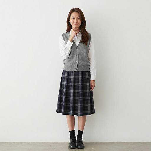 Asian Woman in Grey Vest and Plaid Skirt