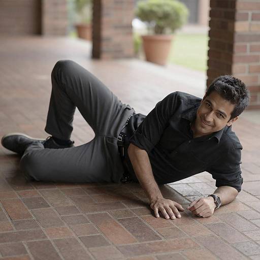 Man Lying on Sunlit Brick Patio