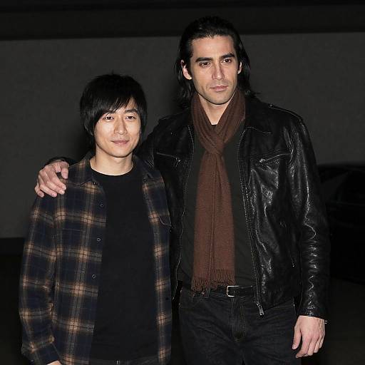 Two Men Posing Together Indoors