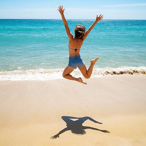 Joyful Woman Leaping on Beach