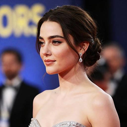 Elegant Woman in Sparkling Silver Dress