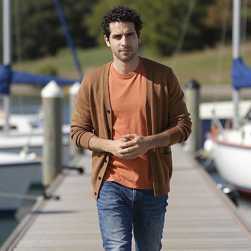 Man in Brown Cardigan by the Dock