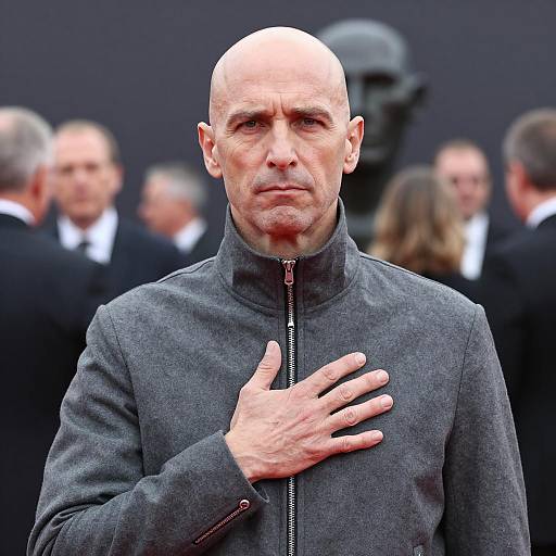 Serious Bald Man in Formal Setting