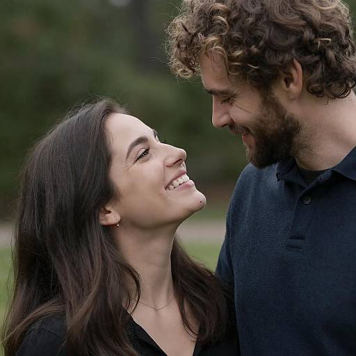 Affectionate Couple in Blurred Greenery