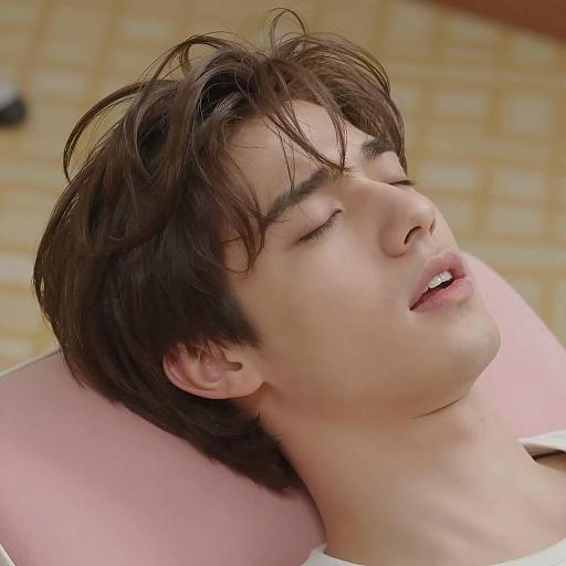 Relaxed Young Man with Tousled Hair Resting