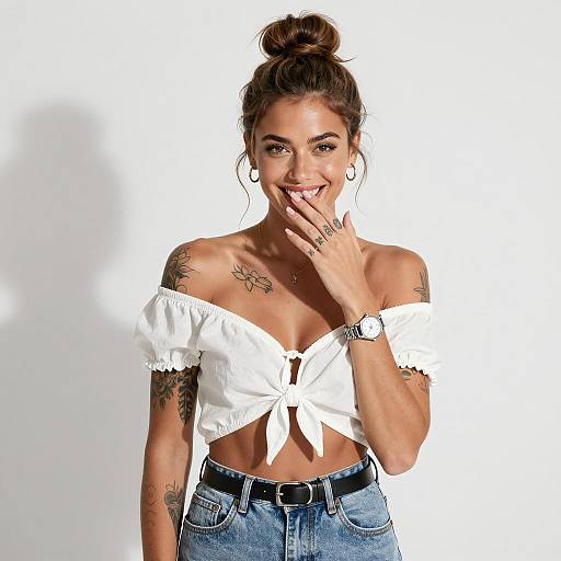 Smiling Tattooed Woman in White Off-Shoulder Top