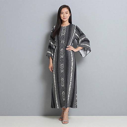 Confident Asian Woman in Patterned Dress