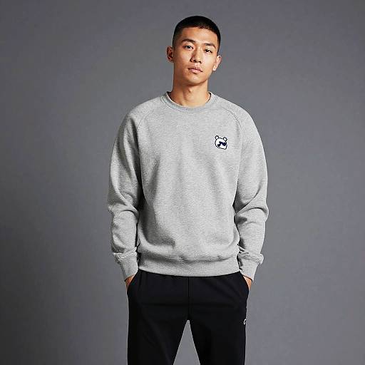 Man in Grey Sweatshirt and Black Pants