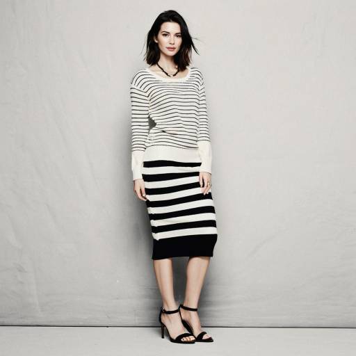 Woman in Black and White Striped Outfit