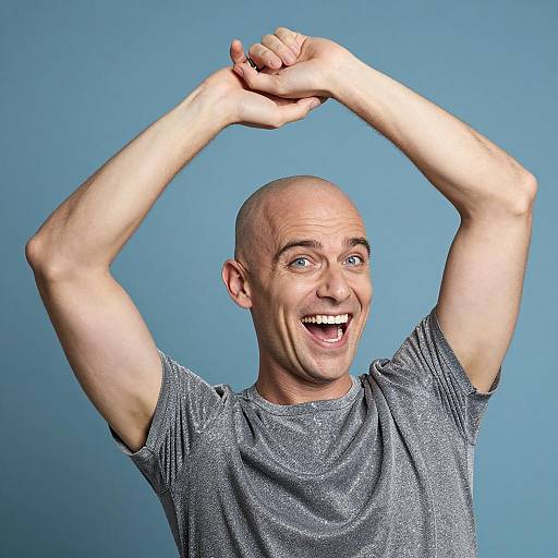 Joyful Bald Man in Glittery Outfit