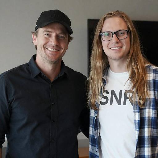 Two Smiling Men in Casual Attire