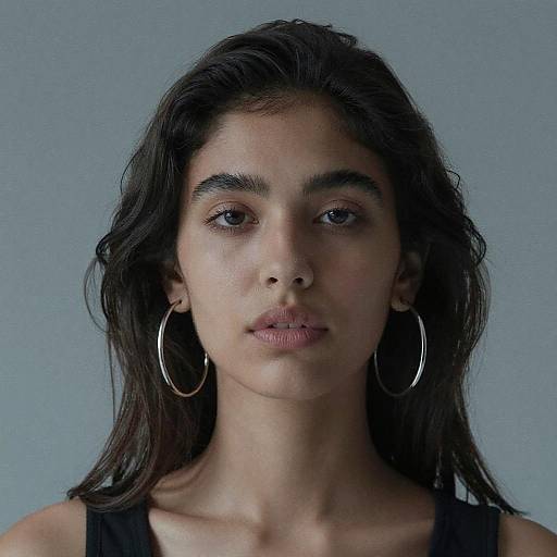 Portrait of Young Woman with Hoop Earrings