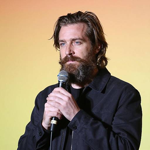 Bearded Man with Microphone Portrait