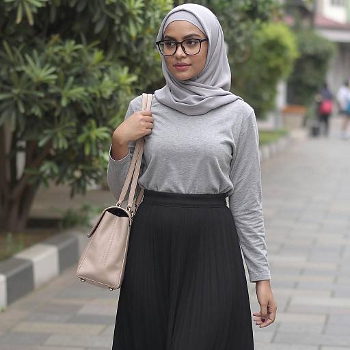 Young Woman in Grey Hijab Outdoors