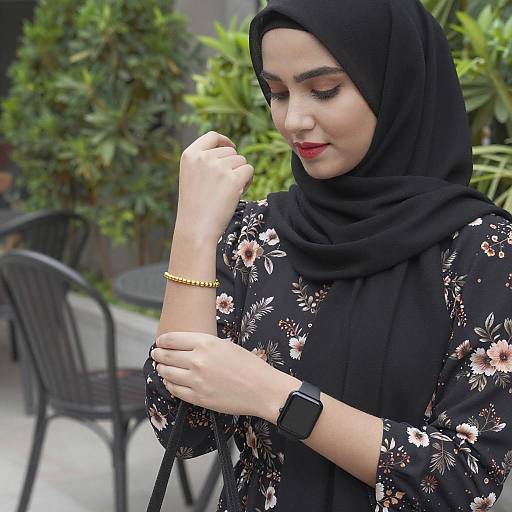 Young Woman in Black Hijab Outdoors