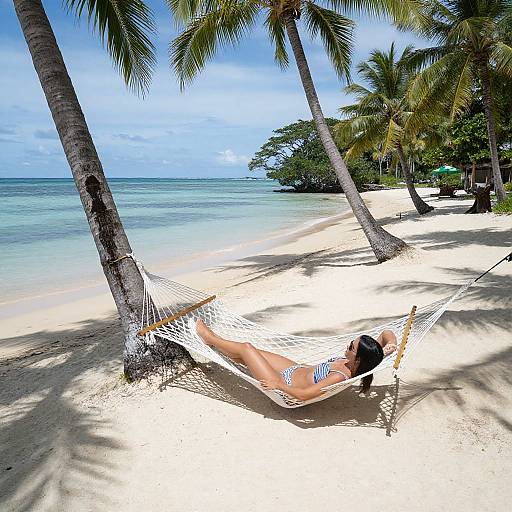 Aerial View: Woman Relaxing on Hammock