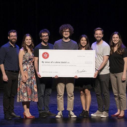 Celebratory Stage Photo with Large Check